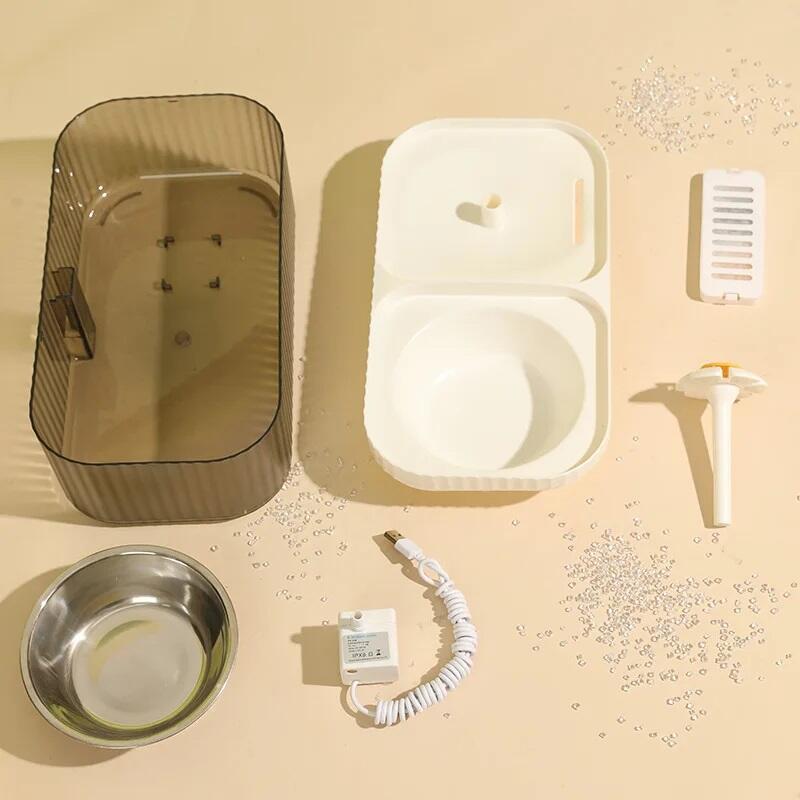 Comedero y bebedero para mascotas con fuente.